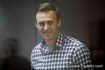 Jailed Kremlin critic Navalny launches hunger strike in bid for medical care - Reuters