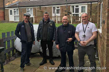 Team effort as homeless veteran gets keys to flat