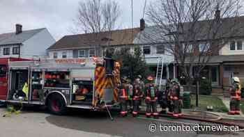 Firefighters tackle two-alarm fire at Etobicoke townhouse