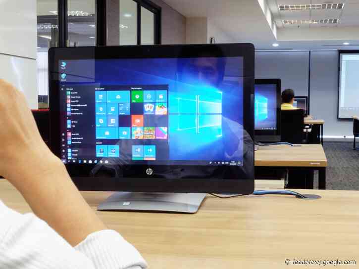How to split your screen on a Windows 10 computer to view multiple program windows at once