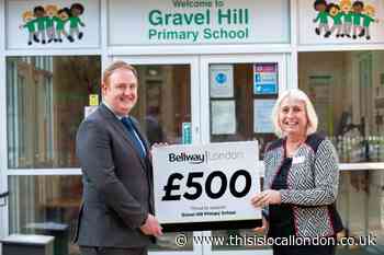 Housebuilder donates book vouchers to Bexleyheath school