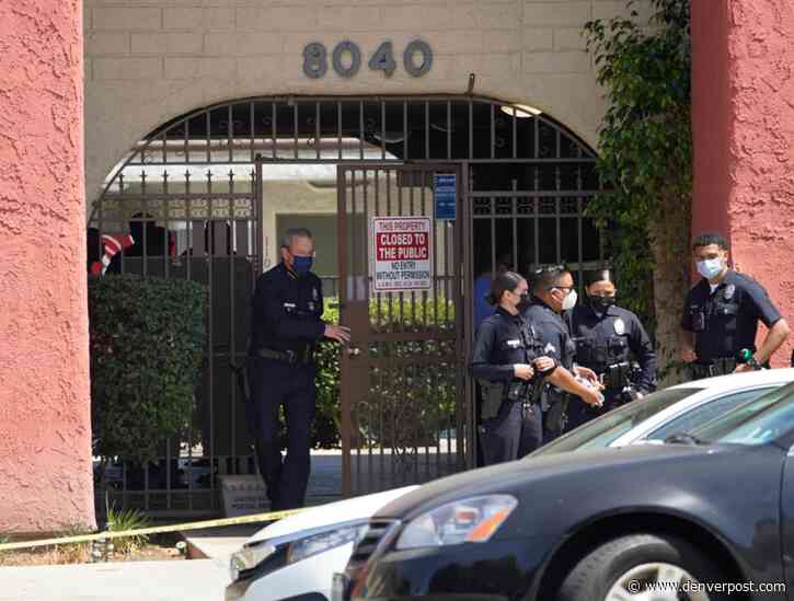 Mother arrested after 3 children found slain in Los Angeles