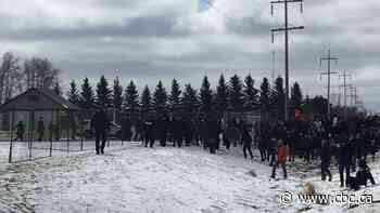 Hundreds rally outside Alberta church closed by health officials