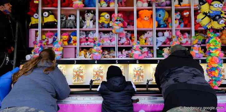 Photos show ecstatic kids marking the reopening of Coney Island's Luna Park, as New York prepares for a summer of joy