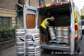 A pint and a haircut: UK eases some virus curbs in England