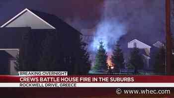 Crews battle house fire in Greece