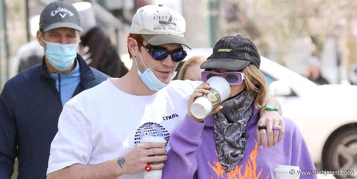 KJ Apa & Clara Berry Grab Coffees To Go While Walking Her Dog in Vancouver