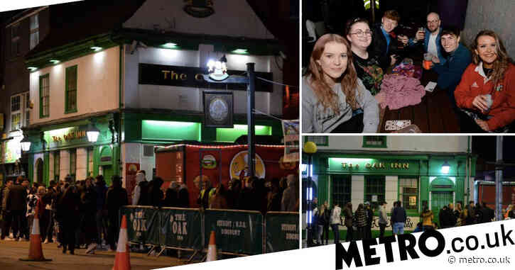 Pub investigated after crowds line street for lockdown reopening