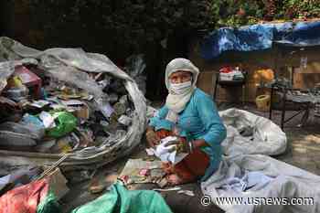 The Latest: UN Chief Calls for Tax on Pandemic Profiteers
