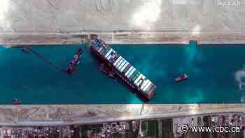 Ship stuck in Suez Canal forbidden from leaving Egypt until $900M bill is paid