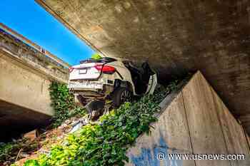Man Fleeing Police Crashes, Wedges Maserati Under Freeway