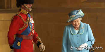 Here's why the queen was giggling in that viral photo with Prince Philip