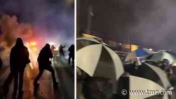 Daunte Wright Protesters Use Umbrellas for Protection on 3rd Night