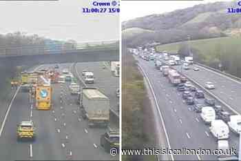 M25 hit with long delays after fire closes three lanes