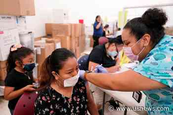 The Latest: COVID-19 Blamed for Large Increase in US Deaths