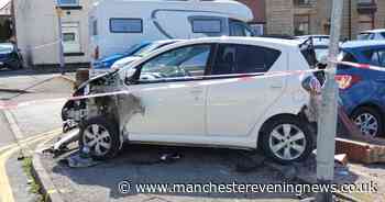 Two in hospital after car crashes into wall on Bolton street - Manchester Evening News