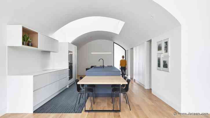 Vaulted tunnel runs through brick house by Batay-Csorba Architects