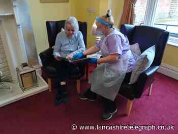 Miller Homes donates books to Blackburn dementia patients