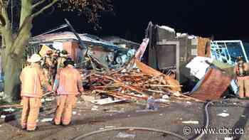 Fire crews respond to late night explosion that 'completely' destroyed a Hamilton home