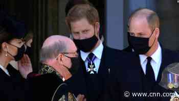 Princes William and Harry walk together after grandfather's funeral