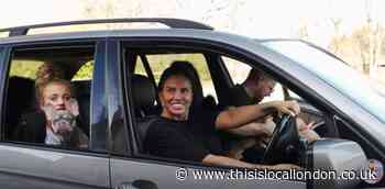 Katie Price laughs at Bexley driving ban behind the wheel