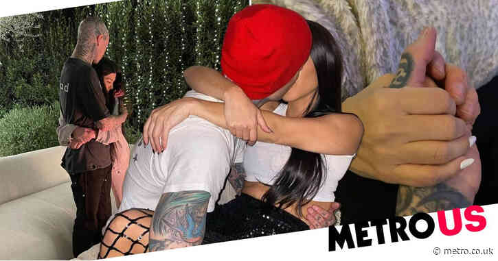 Kourtney Kardashian and Travis Barker pictured kissing for first time as he celebrates her birthday with racy tribute