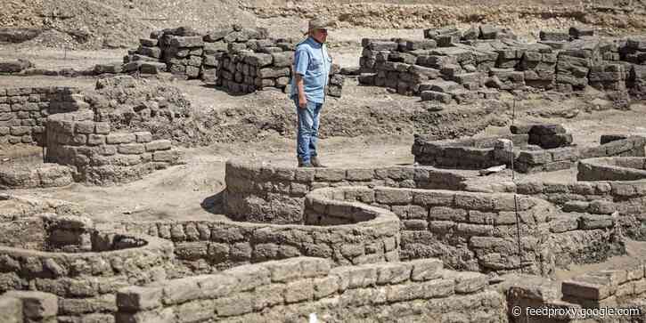 Photos show ancient Egyptian artifacts and skeletons found in a 'lost golden city' built by King Tut's grandfather
