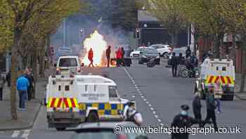 Police monitoring crowd of youths as trouble breaks out in west Belfast