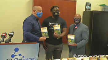 Buffalo City Court Judge, local author donate books to local students