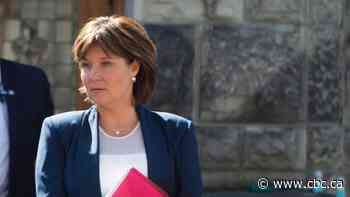 Former B.C. premier says government didn't alert her to rise in money laundering until 2015