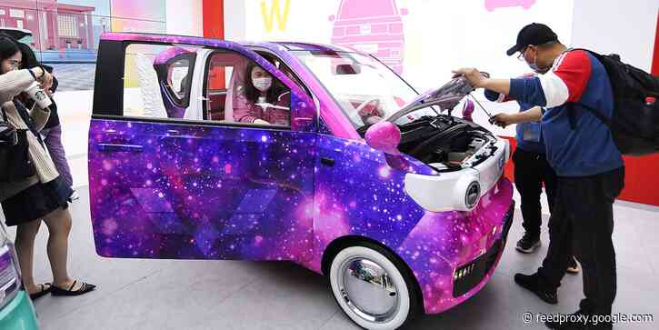 GM showed off new, colorful versions of its tiny sub-$6,000 electric cars that outsell Teslas in China. Take a look.