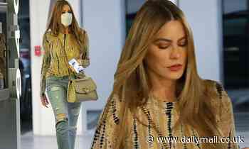 Sofia Vergara runs errands in Beverly Hills in yellow and black tie dye blouse and distressed jeans - Daily Mail
