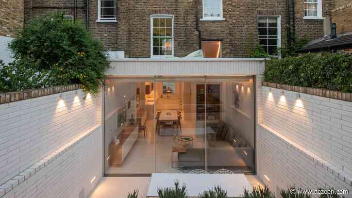 Moxon Architects remodels Victorian terrace with sunken garden and minimalist interiors