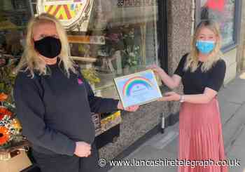 Florist wins award after surprising independent businesses with floral welcome back