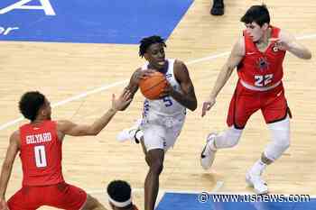 Kentucky's Clarke Mourned by Teammates, Basketball World