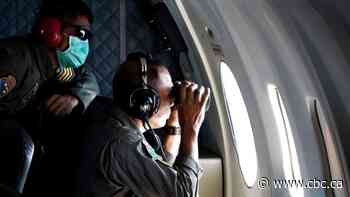 Indonesian navy loses hope of finding survivors after spotting debris from lost submarine