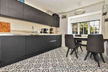 Great views of countryside and fishing lodge make this property a catch of the day in Bromley Cross