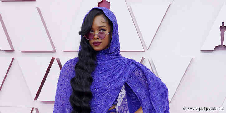 H.E.R. Turns Heads In Sheer Jumpsuit & Cape at Oscars 2021