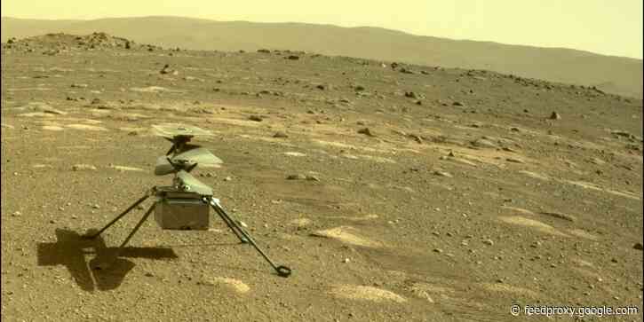 NASA's Mars helicopter Ingenuity took its first aerial color photos of the Red Planet's surface. Take a look.