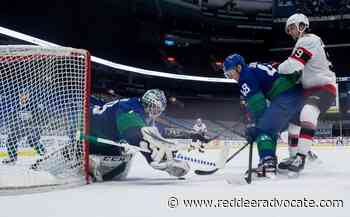 Holtby solid as Vancouver Canucks edge Ottawa Senators 4-2 - Red Deer Advocate