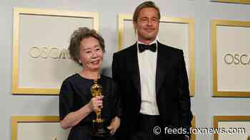 Brad Pitt fights back tears during 'Minari' actress' Oscars acceptance speech