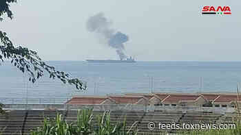 Oil tanker off Syria coast on fire; government says drone attack