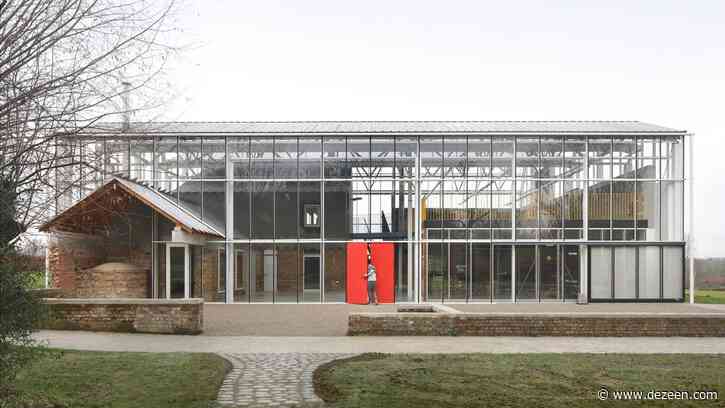 Steel-and-glass "greenhouse" envelops existing buildings at Paddenbroek Education Centre