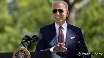 Biden puts new CDC mask guidelines into practice