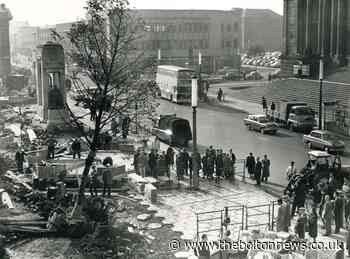 Crowds gather in Bolton's Victoria Square to see fountains