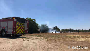 Authorities shut down southeast Fresno intersection as firefighters battle fire