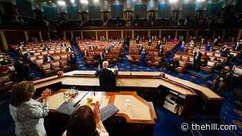 Biden offers traditional address in eerie setting