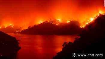 Wildfire was set to cover up woman's murder, authorities say