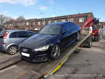 Audi causing obstruction recovered by Bolton police