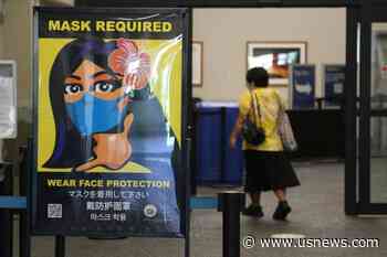 US Keeps in Place Mask Requirement on Planes, Transit